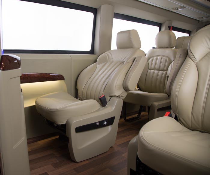 tempo traveller with recliner seats